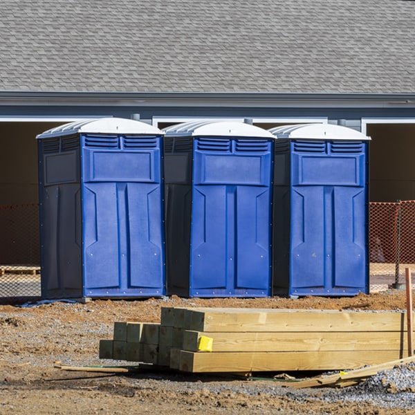 what is the cost difference between standard and deluxe portable restroom rentals in Glasser